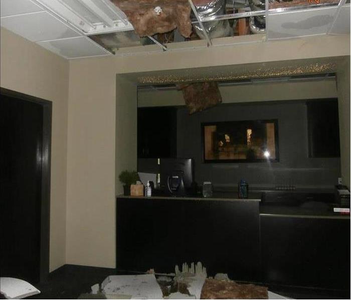 Commercial office with ceiling collapsed